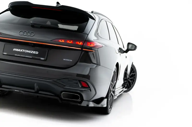 pol_po_Rear-Splitter-with-vertical-bars-V-4-Audi-A6-S-Line-C9-24007_2webp - OPSHOLDERS Rear view of a black Audi SUV with red taillights and '#MAXTONIZED' on the license plate.