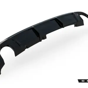 Dark automotive bumper cover or aero lip component, shown in side view with mounting brackets against a white background (Maxton Design branding visible).