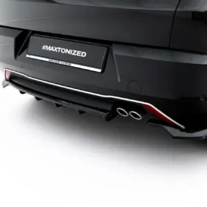 Rear view of a glossy black car with a license plate reading #MAXTONIZED and Gazda Group branding on the plate area.