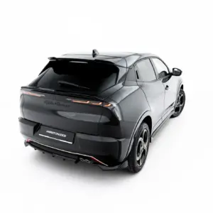 Rear three-quarter view of a dark gray luxury SUV with visible taillights and a '#MAXTONIZED' plate on a white background.