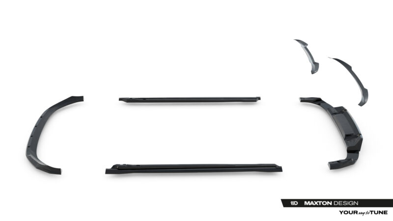 Set of black car exterior trim pieces laid out on a white surface, forming a circular frame.ek