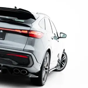 Silver Audi SUV seen from the rear-right, highlighting taillights and the #MAXTONIZED license plate area