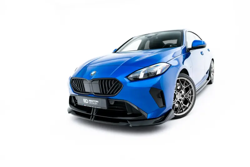 pol_po_Set-of-Splitters-BMW-2-M-Pack-Gran-Coupe-F74-23856_13webp - OPSHOLDERS Blue sports car from a low front-left angle, showcasing sleek grille and alloy wheels (car brand badge visible).