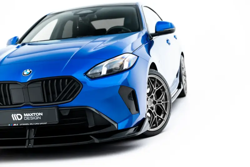 pol_po_Set-of-Splitters-BMW-2-M-Pack-Gran-Coupe-F74-23856_3webp - OPSHOLDERS Front-left angled view of a blue BMW with a black grille, headlight, and alloy wheel; Maxton Design plate visible on the bumper.