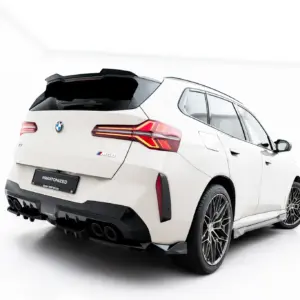 Rear three-quarter view of a white BMW SUV, showing distinctive taillights, quad exhausts, and large alloy wheels.