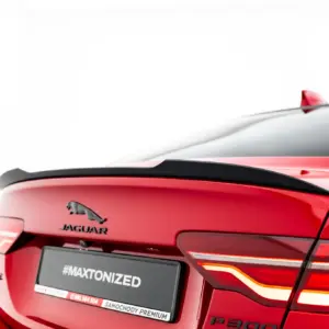 Red Jaguar SUV rear view, showing the Jaguar emblem, taillights, and a license plate reading #MAXTONIZED