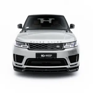 Front view of a silver Range Rover with prominent grille and LED headlights, facing forward against a white background.