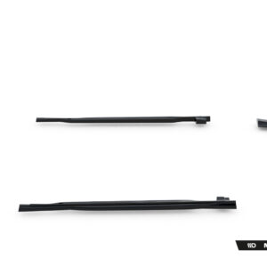 Disassembled black car body kit parts laid out on white background with Maxton Design logo in the corner