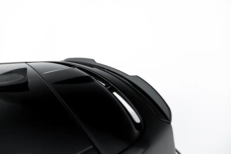 pol_po_Set-of-Splitters-Land-Rover-Range-Rover-Sport-Mk2-Facelift-23834_5webp - OPSHOLDERS Close-up of a glossy black car roof with a sleek, curved roofline against a white background.