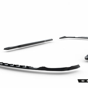 Disassembled car body kit parts laid out on a white background, black and gray pieces scattered with Maxton Design branding