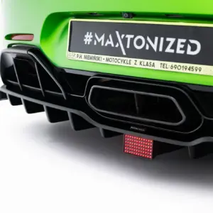 Close-up of a bright green vehicle rear with a black license plate reading #MAXTONIZED and a red LED taillight beneath.