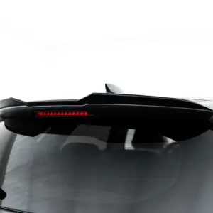 Partial rear view of a white car showing a black spoiler and a red taillight strip.