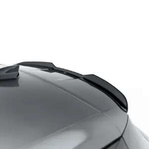 Close-up of a silver car hood with a windshield wiper resting at the bottom edge.