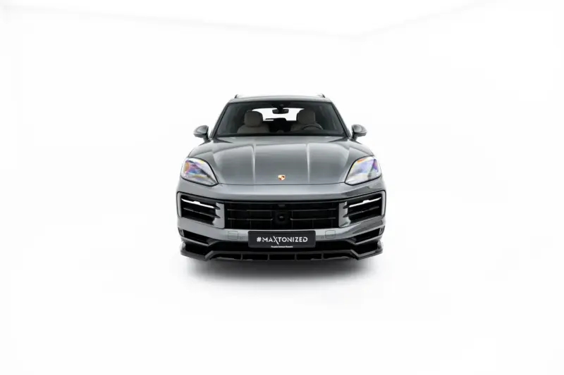 pol_po_Set-of-Splitters-Porsche-Cayenne-SUV-Mk3-Facelift-23886_14webp - OPSHOLDERS Front view of a silver Porsche SUV (Cayenne) facing the camera, with #MAXTONIZED plate visible on the grille badge area.