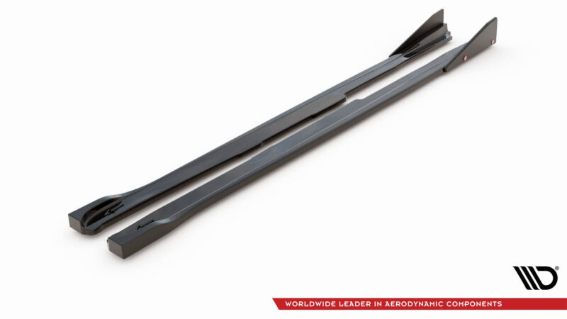 Pair of dark gray aerodynamic blades laid diagonally on a white background, with a red slogan banner reading 'Worldwide Leader in Aerodynamic Components' and a small WD logo bottom right.
