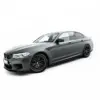 pol_po_Set-of-Splitters-V-1-BMW-M5-F90-23925_3webp - OPSHOLDERS Gray BMW sedan shown from a front-left angle with black alloy wheels on a white background