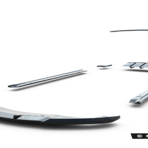 Disassembled silver car spoiler and trim pieces spread across a white studio background, with Maxton Design branding visible in the corner