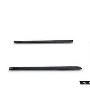 Set of black automotive body kit pieces laid out on a white background (front/rear bumper fragments visible). Watermark reads Maxton Design at bottom right.