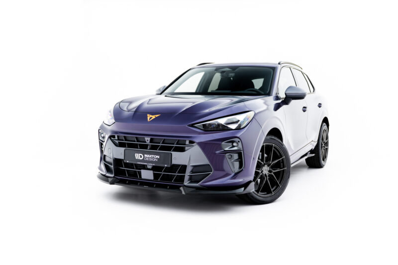 Front-left view of a purple SUV with a bold front grille and black alloy wheels on a white background, logo visible on hood badge.