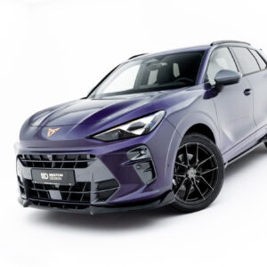 Front-left angled view of a purple SUV with a bold front grille and large black alloy wheels, set against a white background.