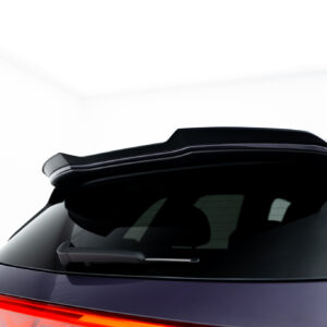Rear view of a white car showing a dark rear spoiler and red taillight strip at the back.