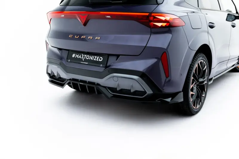 Rear view of a dark blue CUPRA SUV with glowing red taillights and a black plate reading #MAXTONIZED.