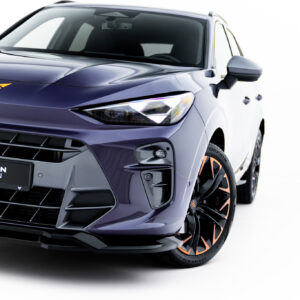 Front-left angle of a dark blue car with orange-accent wheels and Maxton Design badge on a white background