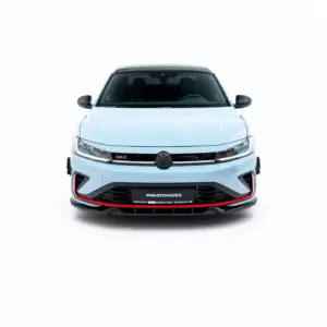 Front view of a light blue car facing the camera with a black grille and red accents along the bumper labeled '#MAXTONIZED'.
