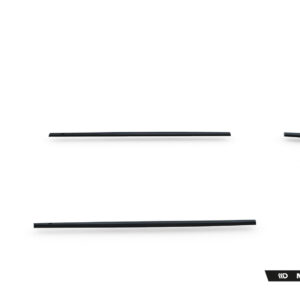 Set of black car body kit pieces laid out in a rough circle on a white background, with a Maxton Design watermark in the bottom-right corner.