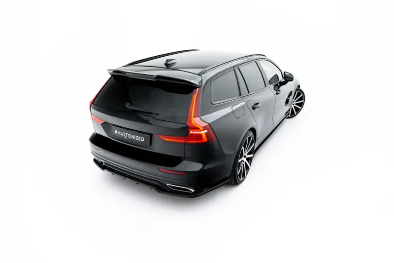 pol_po_Set-of-Splitters-Volvo-V60-R-Design-Mk3-23996_14webp - OPSHOLDERS Three-quarter rear view of a gray Volvo SUV with a spoiler and sporty wheels, seen from above-right.
