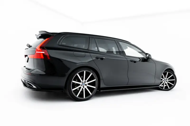 pol_po_Set-of-Splitters-Volvo-V60-R-Design-Mk3-23996_6webp - OPSHOLDERS Rear three-quarter view of a black SUV with red taillights, large alloy wheels, and a sporty spoiler.
