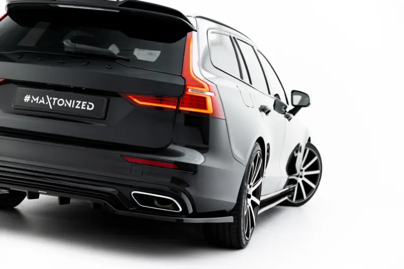 pol_po_Set-of-Splitters-Volvo-V60-R-Design-Mk3-23996_9webp - OPSHOLDERS Black SUV shown from the rear-right, featuring red LED taillights and a #MAXTONIZED license plate badge.
