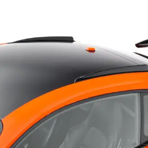 Close-up of a gray car roof with orange accent stripe and a rear spoiler edge visible on the right