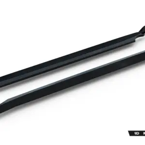 Pair of glossy black car side skirts laid diagonally on a white background with Maxton Design branding.