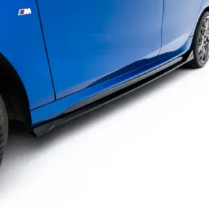 Blue car side panel with BMW M badge and alloy wheel visible on left, white backdrop