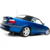 pol_po_Side-Skirts-Diffusers-BMW-M3-3-M-Pack-Coupe-Cabrio-E36-23877_2webp - OPSHOLDERS Blue BMW 320i convertible seen from the rear-left, with a black soft top and alloy wheels
