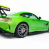 pol_po_Side-Skirts-Diffusers-Mercedes-AMG-GT-R-C190-Facelift-23890_2webp - OPSHOLDERS Green sports car with a large rear wing, glossy lime paint, and sporty wheels, shown from the back-left side against a white background.