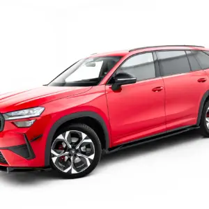 Front-left angled view of a red SUV showing grille, headlight, and alloy wheels on a white background.