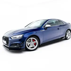 Blue Audi S5 coupe, angled from the front-left showing grille, headlight, and large wheels on a white background.