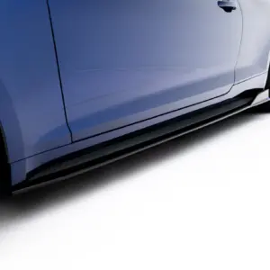 Close-up of a blue car's side panel with a visible door seam and wheel on the right, against a white background.