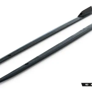 Pair of dark gray car roof crossbars on a white background with Maxton Design branding bottom right.