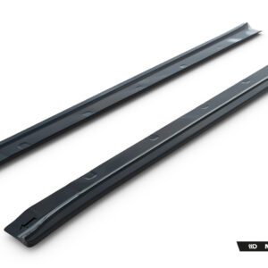 Pair of black roof rack rails with mounting holes on a white backdrop.