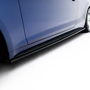 Close-up of a blue car's side panel and wheel against a white background, showing the rocker area and door seam.