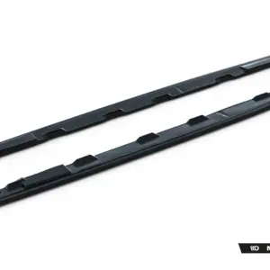 Two black windshield wiper blades laid diagonally across a white background, with Maxton Design branding visible in the corner.