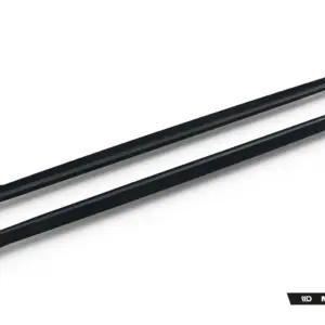 Pair of glossy black car roof rails shown diagonally on a white background, with Maxton Design branding in the bottom-right corner.