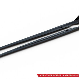 Two dark gray aerodynamic windshield wiper blades laid diagonally on a white background, with the brand logo and red slogan ribbon visible in the bottom-right corner.