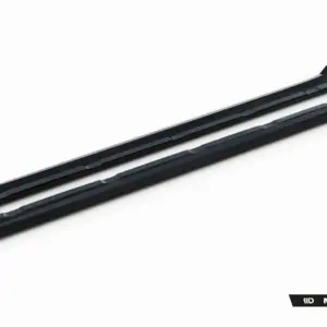 Pair of black car windshield wiper blades with angular segments, diagonally laid on a white background; Maxton Design branding in the corner.