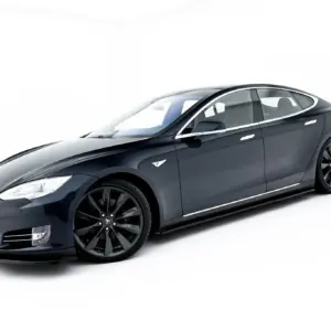 Dark blue Tesla electric sedan shown from a low front-left angle, highlighting the sleek body and large wheels on a white backdrop.