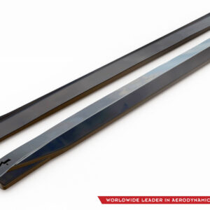 Pair of glossy black aerodynamic side skirts laid diagonally on a white background; MD logo visible in corner.
