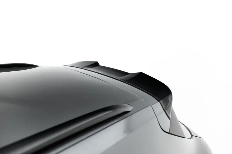 pol_po_Spoiler-Cap-3D-Porsche-Cayenne-SUV-Mk3-Facelift-23885_6webp - OPSHOLDERS Close-up of a glossy dark car roof with a rear spoiler against a white background, highlighting the aerodynamic design.